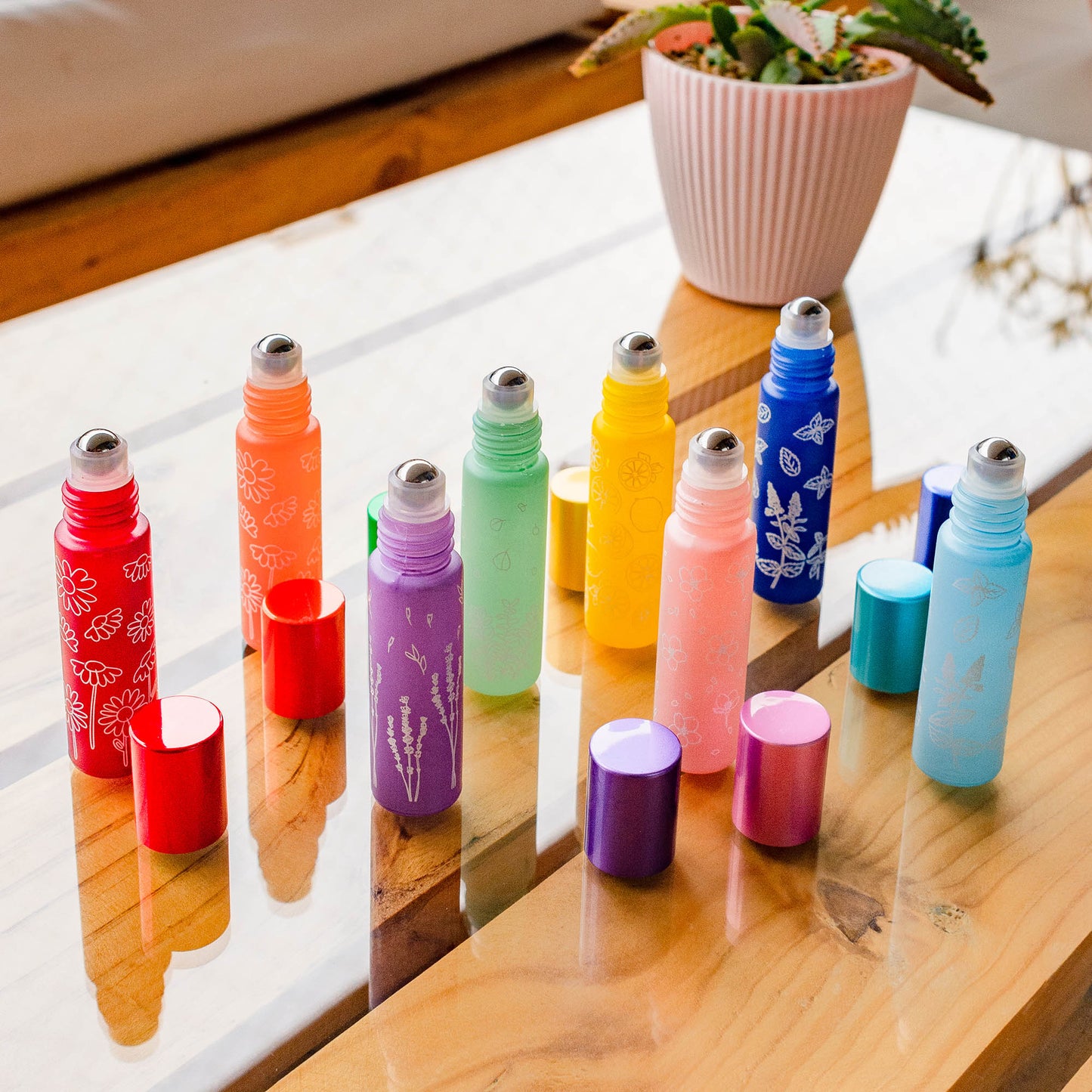 frascos roll on pastel con dibujos para aceites esenciales doterra