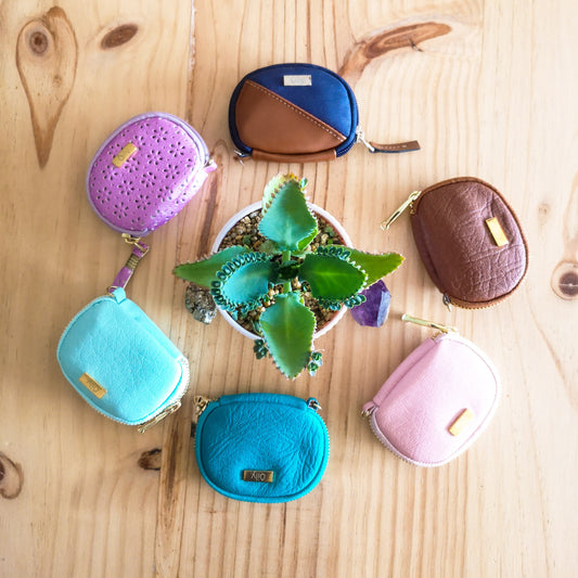 Estuche "monedero" con 8 frascos roll on de 2ml llavero bolso doterra
